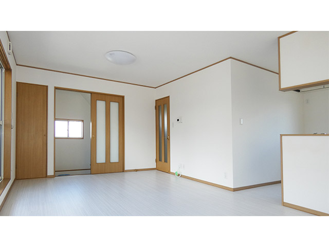 L型キッチンにしてリビングを広く