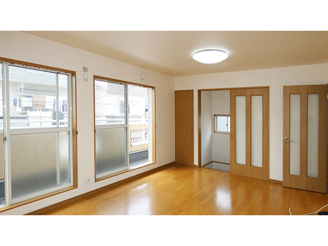 L型キッチンにしてリビングを広く